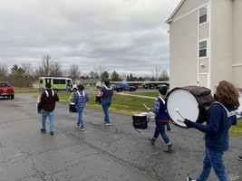 Hemlock Drumline Brightens Seniors’ Day Over Holiday Break